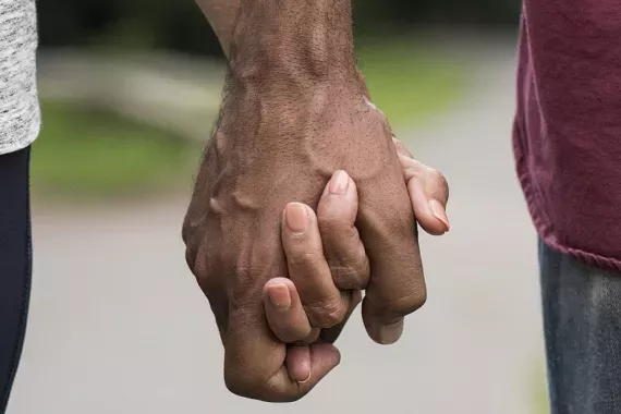 couple holding hands